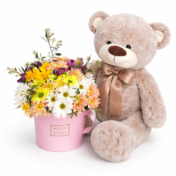 Teddy bear and flowers